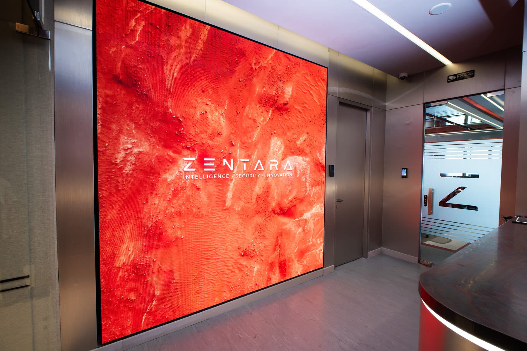 The ZENTARA wall — red marble, Jakarta headquarters